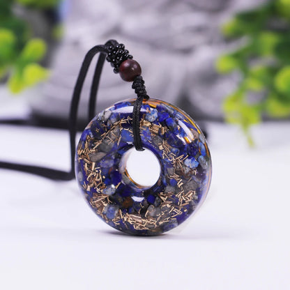 Donut pendant in orgonite and lapis lazuli 