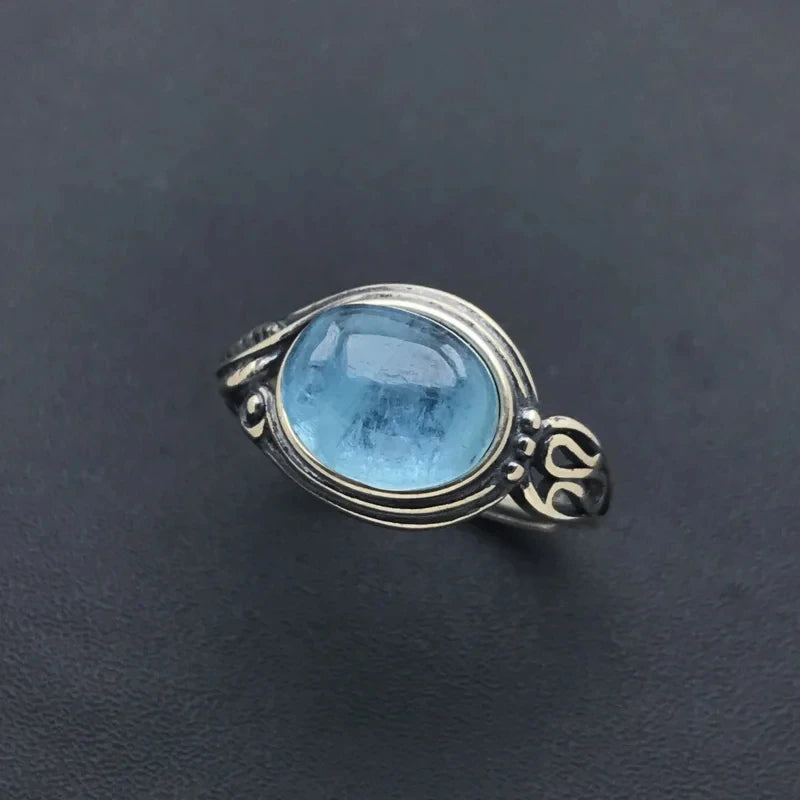 Silver ring with blue stone 