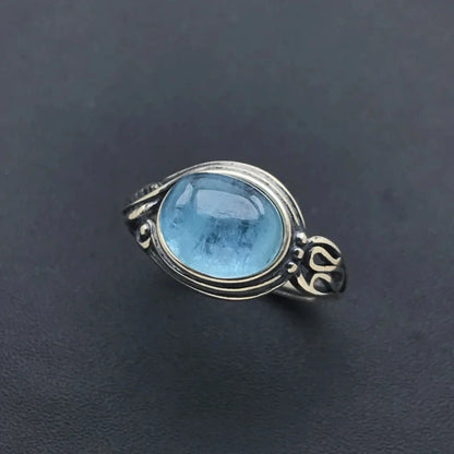 Silver ring with blue stone 