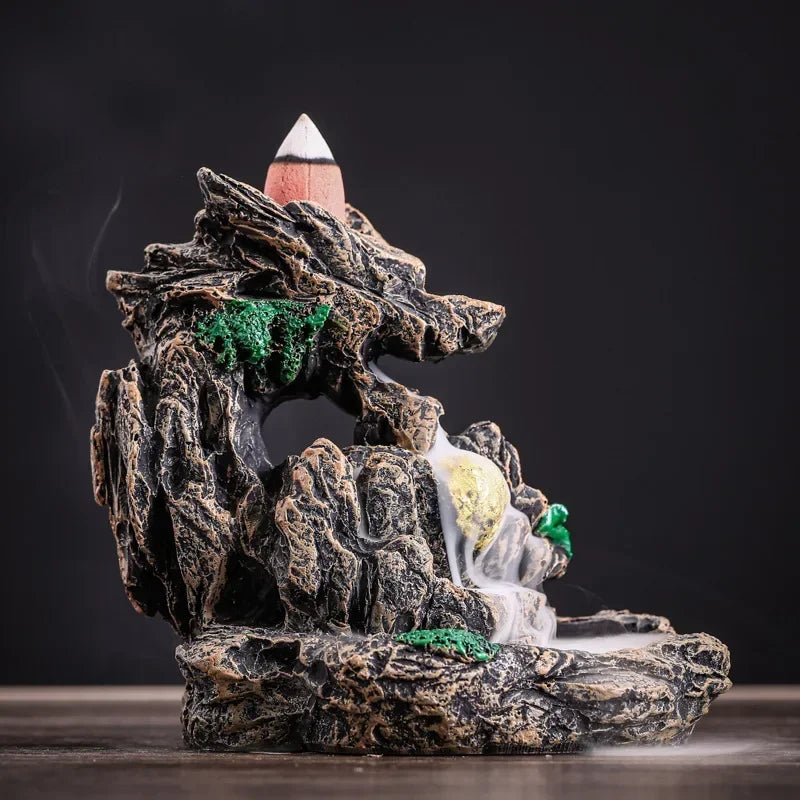 Incense diffuser with fluid smoke effect 