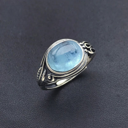 Silver ring with blue stone 