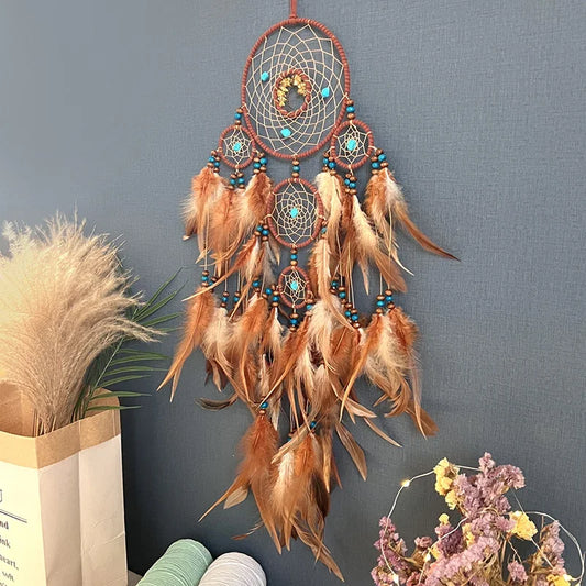 Stone and feather wall decoration 