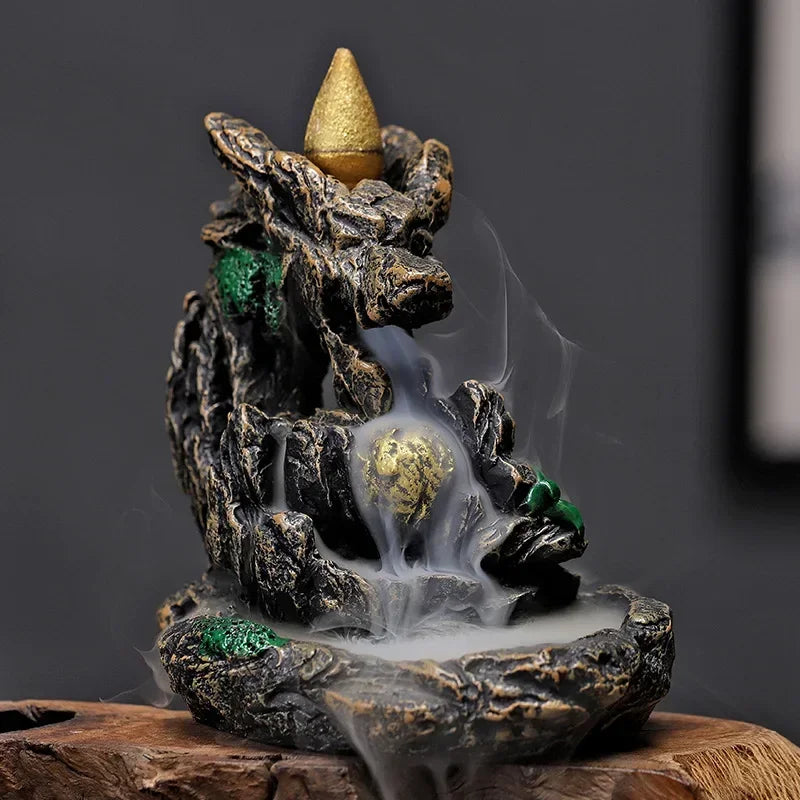 Incense diffuser with fluid smoke effect 