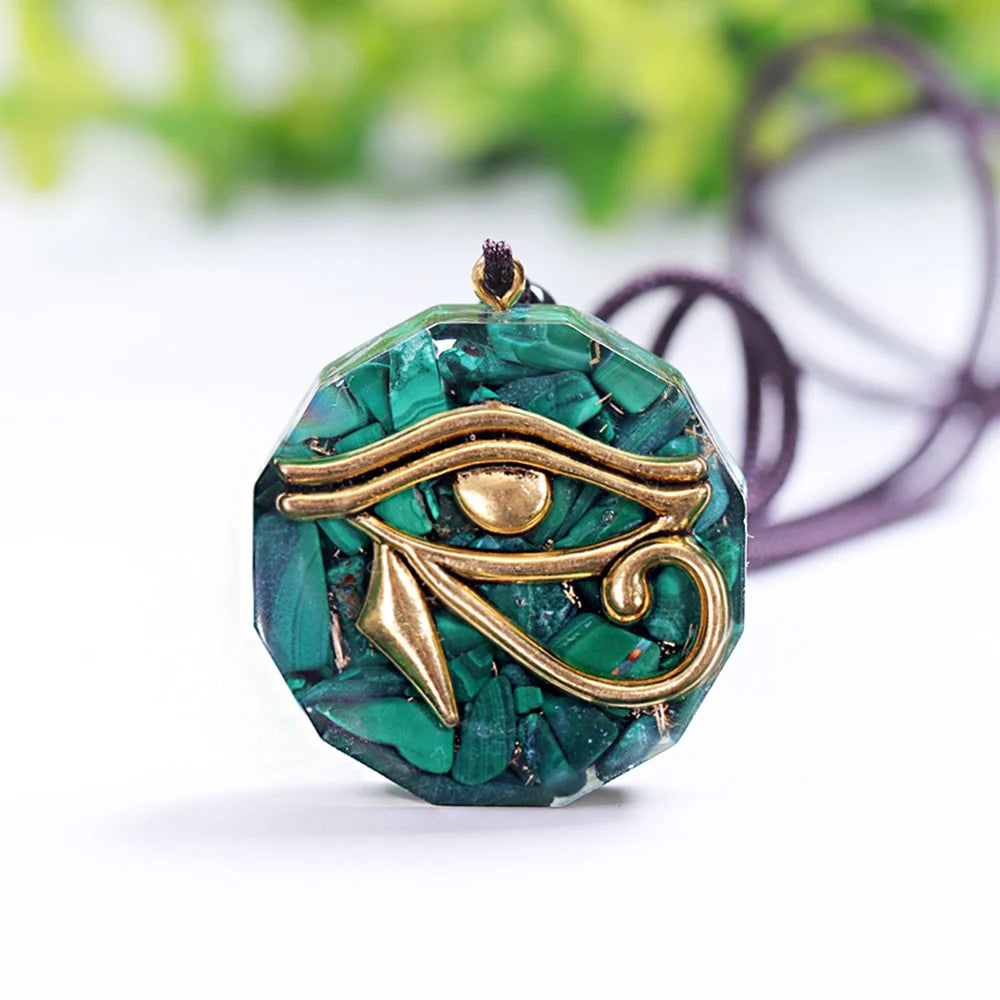 Symbolic pendant in malachite and orgone 