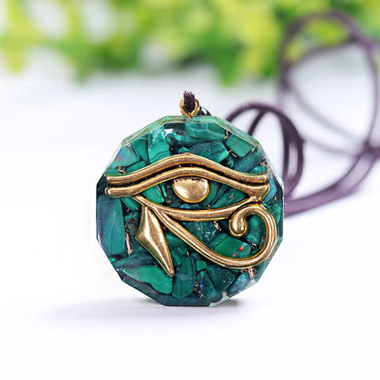 Symbolic pendant in malachite and orgone 